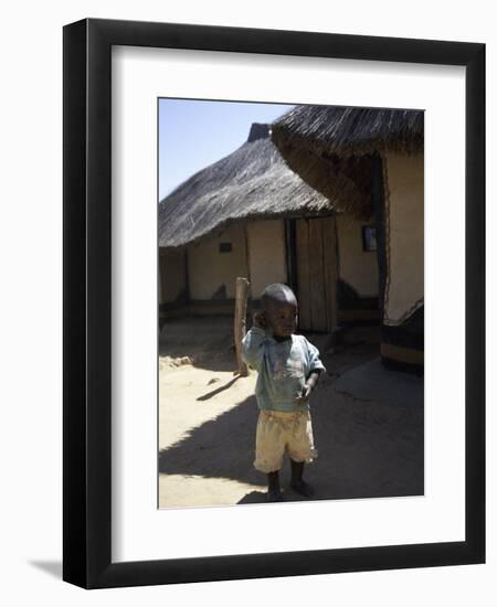 Child by Straw Hut, South Africa-Ryan Ross-Framed Photographic Print