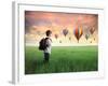 Child Carrying A Backpack Standing On A Green Meadow With Hot-Air Balloons In The Background-olly2-Framed Art Print