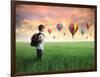 Child Carrying A Backpack Standing On A Green Meadow With Hot-Air Balloons In The Background-olly2-Framed Art Print