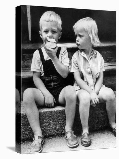 Child Eat an Apple August 25, 1960-null-Stretched Canvas