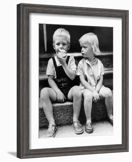 Child Eat an Apple August 25, 1960-null-Framed Photo