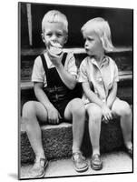 Child Eat an Apple August 25, 1960-null-Mounted Photo