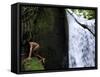 Child from the Ache Indigenous Group Plays Near a Waterfall in Cerro Moroti, Paraguay-null-Framed Stretched Canvas