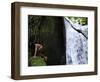 Child from the Ache Indigenous Group Plays Near a Waterfall in Cerro Moroti, Paraguay-null-Framed Photographic Print