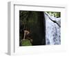 Child from the Ache Indigenous Group Plays Near a Waterfall in Cerro Moroti, Paraguay-null-Framed Photographic Print