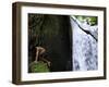 Child from the Ache Indigenous Group Plays Near a Waterfall in Cerro Moroti, Paraguay-null-Framed Photographic Print