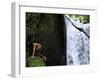 Child from the Ache Indigenous Group Plays Near a Waterfall in Cerro Moroti, Paraguay-null-Framed Photographic Print