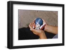 Child Holding Toys-William P. Gottlieb-Framed Premium Photographic Print