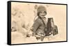 Child in Snow with Old Camera-null-Framed Stretched Canvas