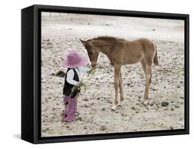 Child in Western Wear Feeding a Pony-Nora Hernandez-Framed Stretched Canvas