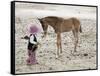 Child in Western Wear Feeding a Pony-Nora Hernandez-Framed Stretched Canvas