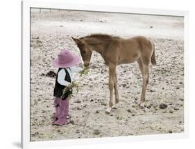 Child in Western Wear Feeding a Pony-Nora Hernandez-Framed Premium Giclee Print