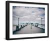 Child on Pier-Clive Nolan-Framed Photographic Print