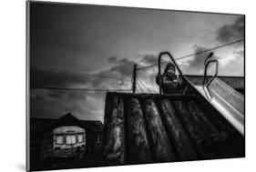 Child on Slide-Clive Nolan-Mounted Photographic Print