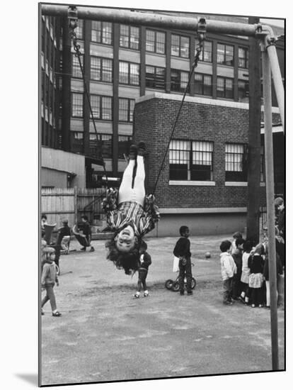 Child on Swings in Playground at the KLH Day Care Center-Leonard Mccombe-Mounted Photographic Print