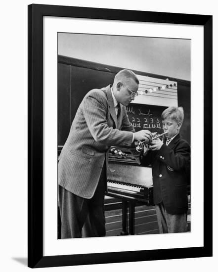 Child Playing Various Musical Instruments-Nina Leen-Framed Photographic Print