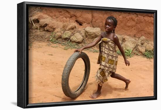 Child playing with a tyre, Tori, Benin-Godong-Framed Photographic Print