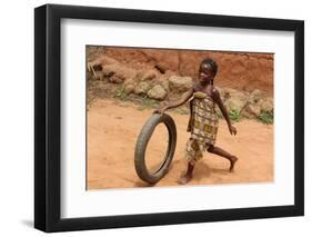 Child playing with a tyre, Tori, Benin-Godong-Framed Photographic Print