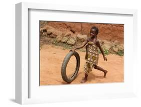 Child playing with a tyre, Tori, Benin-Godong-Framed Photographic Print