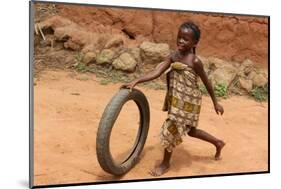 Child playing with a tyre, Tori, Benin-Godong-Mounted Photographic Print