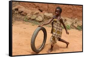 Child playing with a tyre, Tori, Benin-Godong-Framed Stretched Canvas