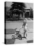 Child Playing with Tricycle-Alfred Eisenstaedt-Stretched Canvas