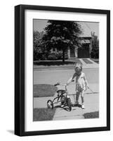 Child Playing with Tricycle-Alfred Eisenstaedt-Framed Premium Photographic Print