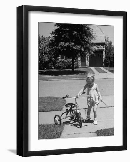 Child Playing with Tricycle-Alfred Eisenstaedt-Framed Premium Photographic Print