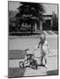 Child Playing with Tricycle-Alfred Eisenstaedt-Mounted Premium Photographic Print