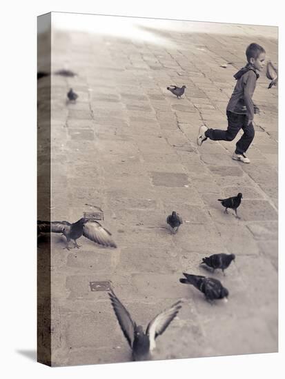 Child Running across Stones, Venice, Italy-Steven Boone-Stretched Canvas