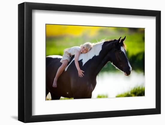 Child Sits On A Horse In Meadow Near Small River-Alexia Khruscheva-Framed Photographic Print