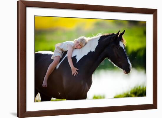 Child Sits On A Horse In Meadow Near Small River-Alexia Khruscheva-Framed Photographic Print