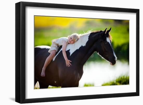 Child Sits On A Horse In Meadow Near Small River-Alexia Khruscheva-Framed Photographic Print