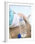 Child Sitting Beside Bottle of Water on Edge of Pool-null-Framed Photographic Print