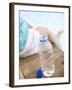 Child Sitting Beside Bottle of Water on Edge of Pool-null-Framed Photographic Print