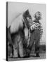 Child Standing Beside a Miniature Horse, Showing Size Comparison-Ed Clark-Stretched Canvas