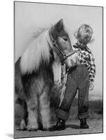 Child Standing Beside a Miniature Horse, Showing Size Comparison-Ed Clark-Mounted Photographic Print