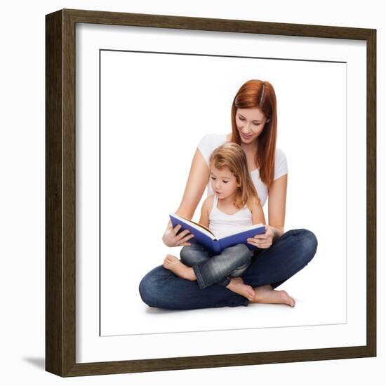 Childhood, Parenting and Relationship Concept - Happy Mother with Adorable Little Girl Reading Book-dolgachov-Framed Photographic Print