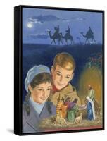 Children Admiring Nativity Scene-Clive Uptton-Framed Stretched Canvas