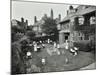 Children and Carers in a Garden, Hampstead, London, 1960-null-Mounted Photographic Print