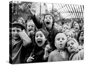 Children at a Puppet Theatre, Paris, 1963-Alfred Eisenstaedt-Stretched Canvas