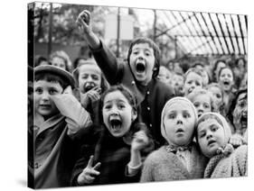Children at a Puppet Theatre, Paris, 1963-Alfred Eisenstaedt-Stretched Canvas
