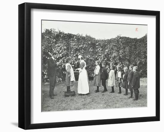 Children Being Weighed in the Garden, Montpelier House Open Air School, London, 1908-null-Framed Premium Photographic Print