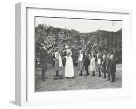 Children Being Weighed in the Garden, Montpelier House Open Air School, London, 1908-null-Framed Photographic Print