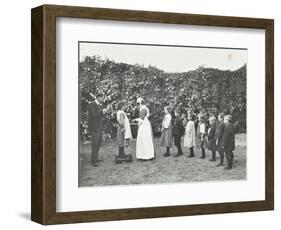 Children Being Weighed in the Garden, Montpelier House Open Air School, London, 1908-null-Framed Photographic Print