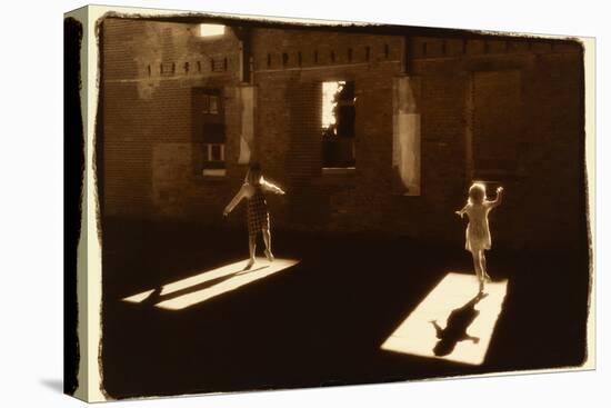 Children dancing in shafts of light-Theo Westenberger-Stretched Canvas