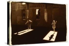 Children dancing in shafts of light-Theo Westenberger-Stretched Canvas