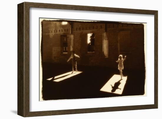 Children dancing in shafts of light-Theo Westenberger-Framed Photographic Print