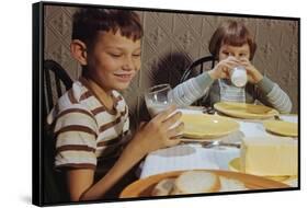 Children Drinking Milk at Dinner Table-William P. Gottlieb-Framed Stretched Canvas