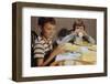 Children Drinking Milk at Dinner Table-William P. Gottlieb-Framed Photographic Print